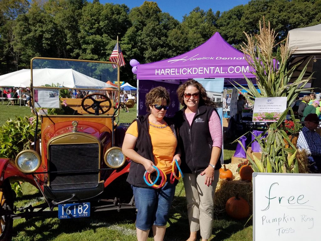 Jensen Employees standing in front of booth