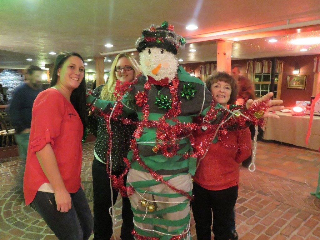 Employees playing a game at the company Christmas party