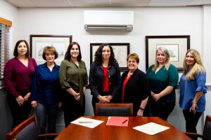 Bright Insurance CSR reps standing in the conference room