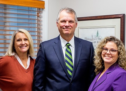 Management team photo of President Steve Ellis, VP Krishna Swanson and Operations Manager Maureen Brogie